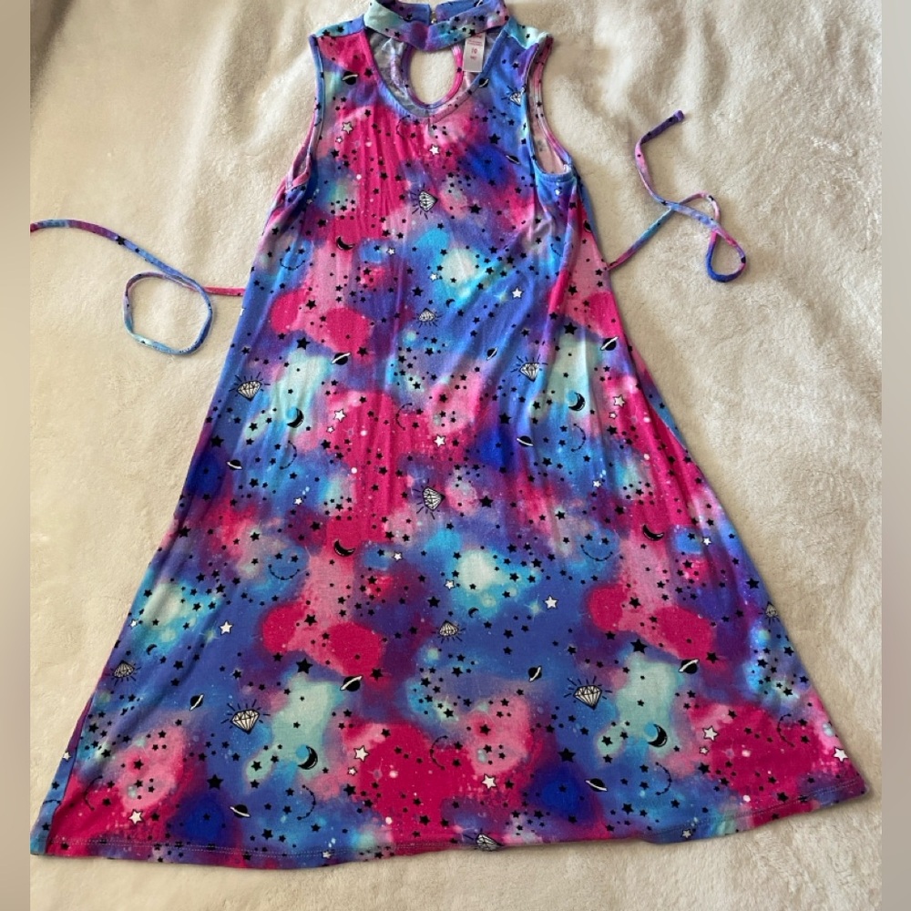 I can’t believe this dress hasn’t sold!! Girls size 10 Justice multicolor dress